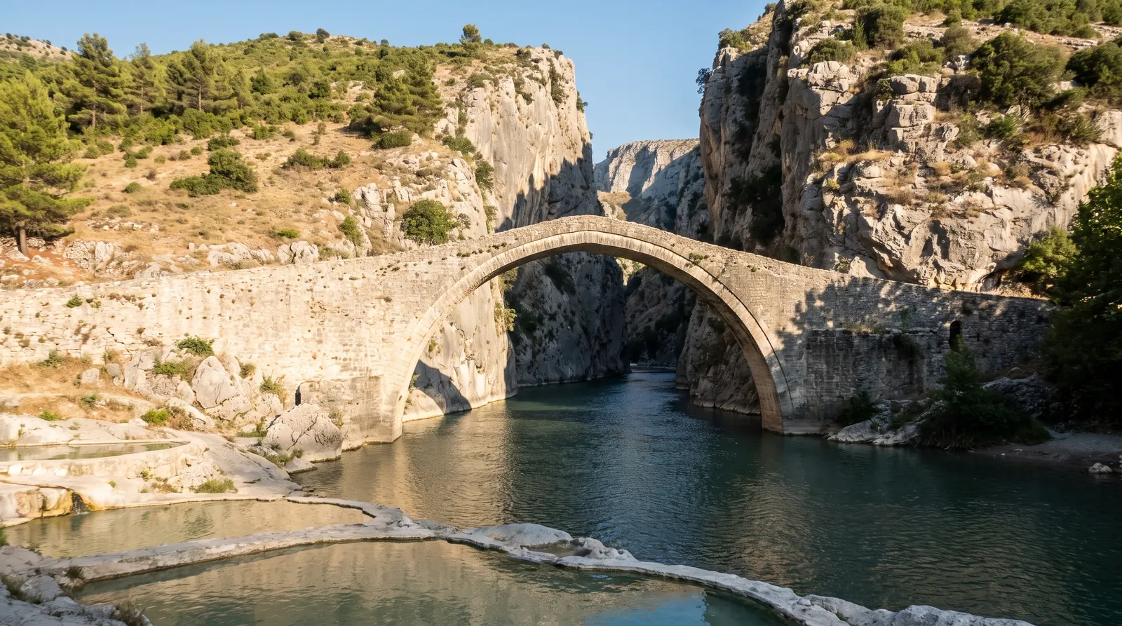 The single-arch Ottoman bridge at the mouth of the Lengarica canyon