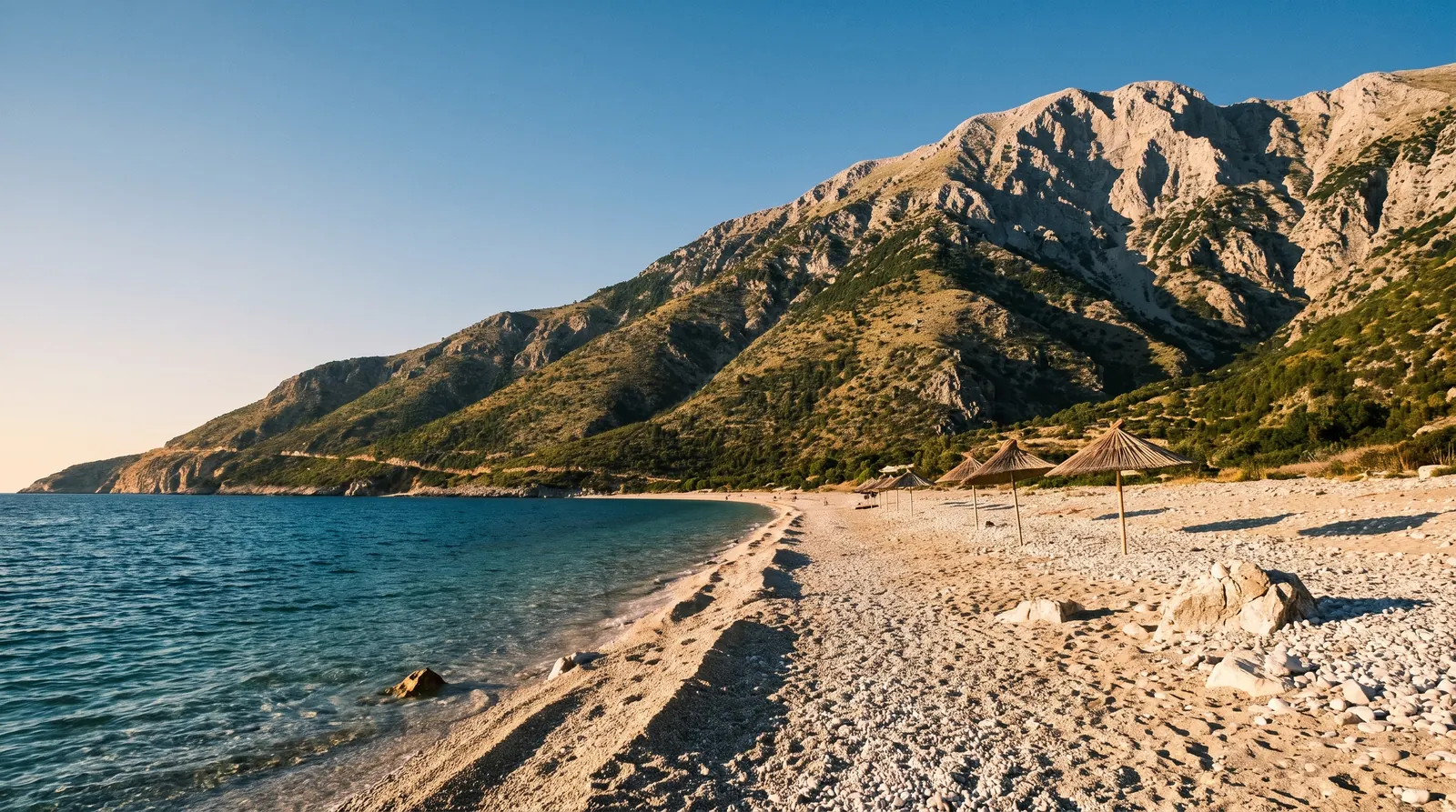 Palase beach under the thousand-metre wall of the Llogara ridge