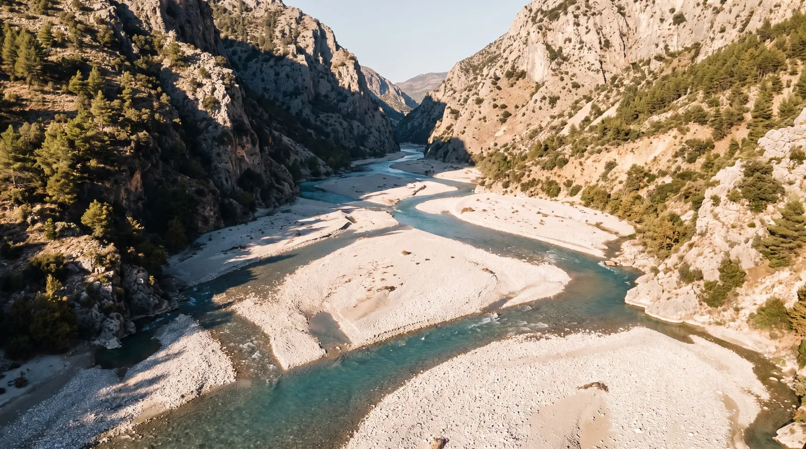 The Vjosa splitting into braided channels around gravel islands in the Kelcyre gorge